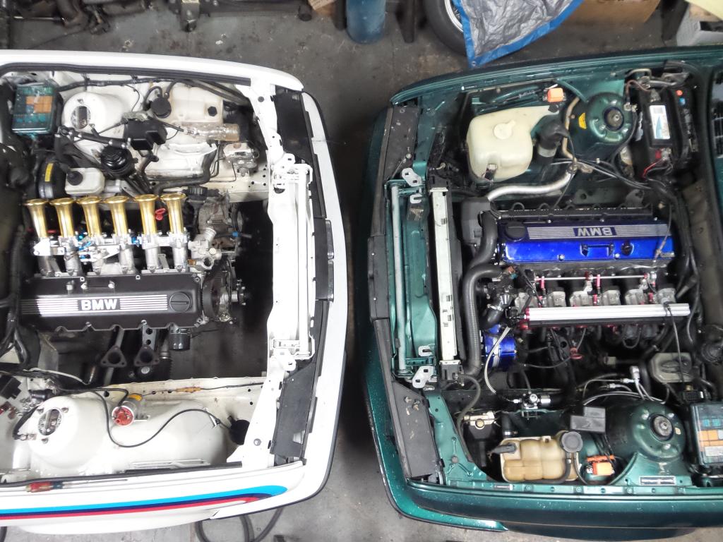 BMW E30 engine bays facing each other