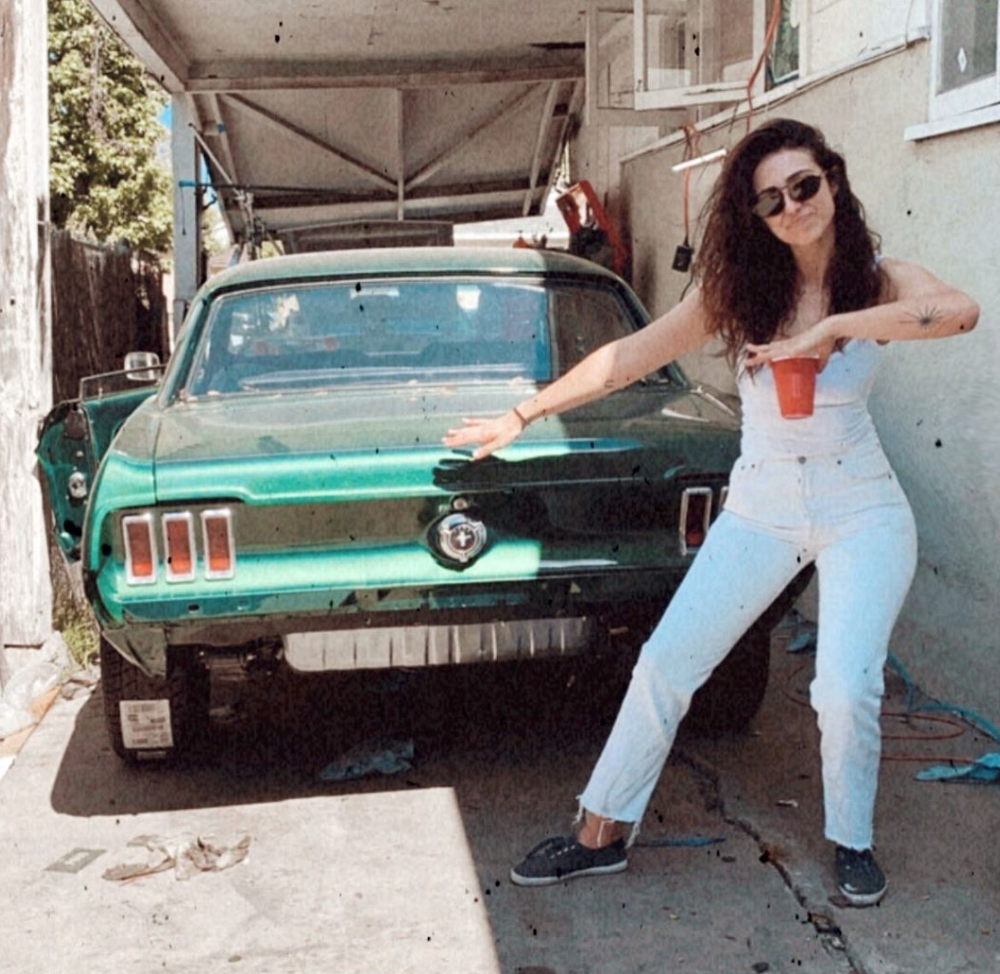 Woman and 1967 Ford Mustang